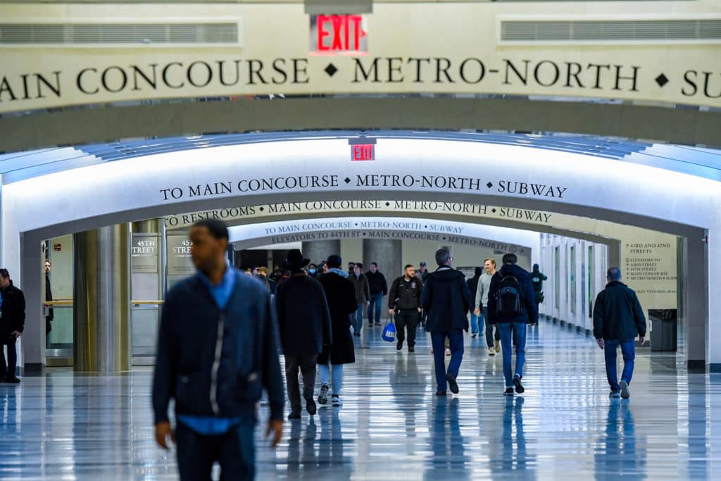 Commuters walk through the new Grand Central Madison concourse