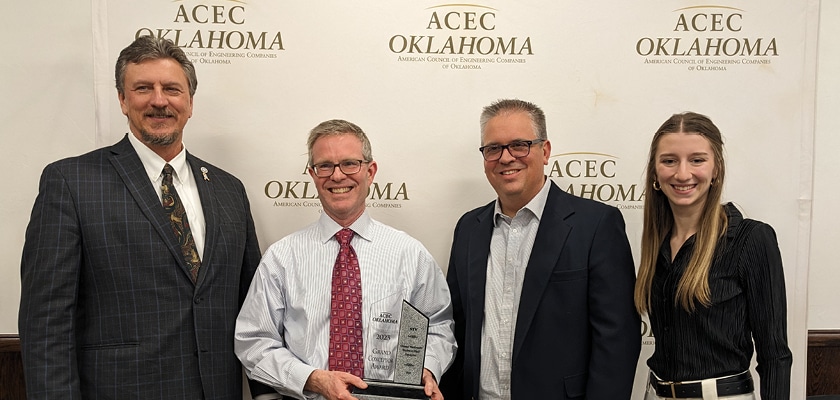 employees holding award for ACEC Oklahoma